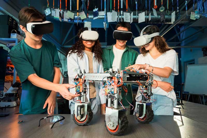 group-young-people-vr-glasses-doing-experiments-robotics-laboratory-robot-table-(1)